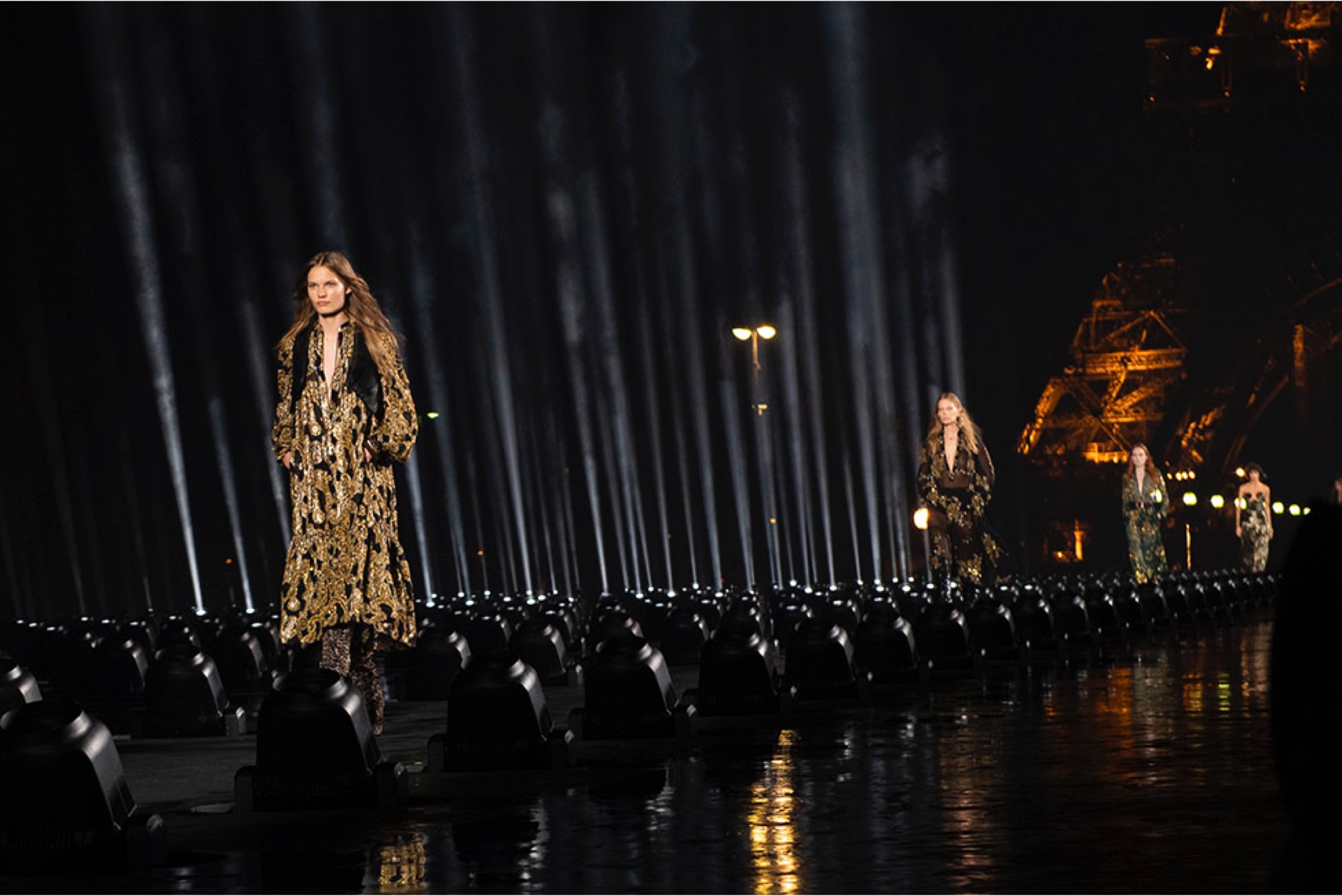 Model walks the runway at the Saint Laurent SS20 show shot by Jasan Lloyd Evans