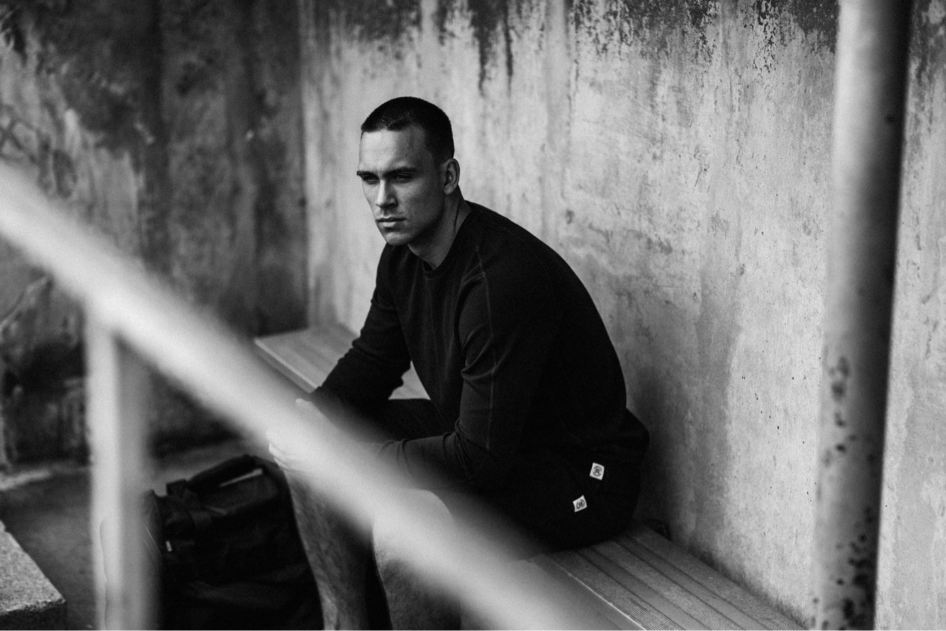Model wearing Reigning Champ Half Zip Sweatshirt
