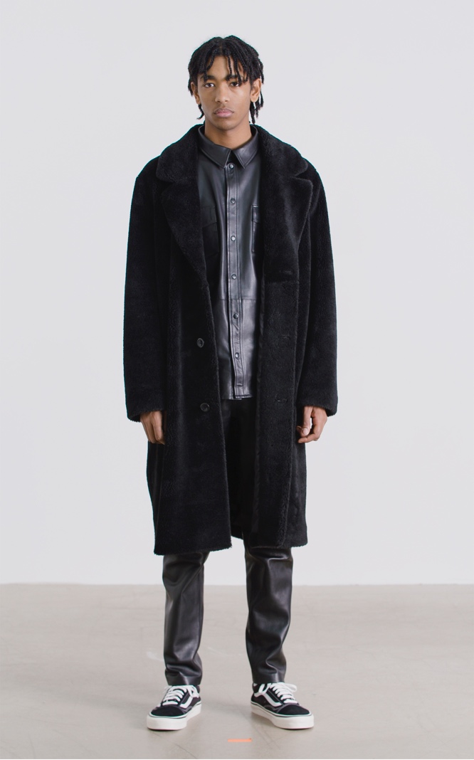 Model wearing STAND STUDIO Arnaud Faux Fur Coat
