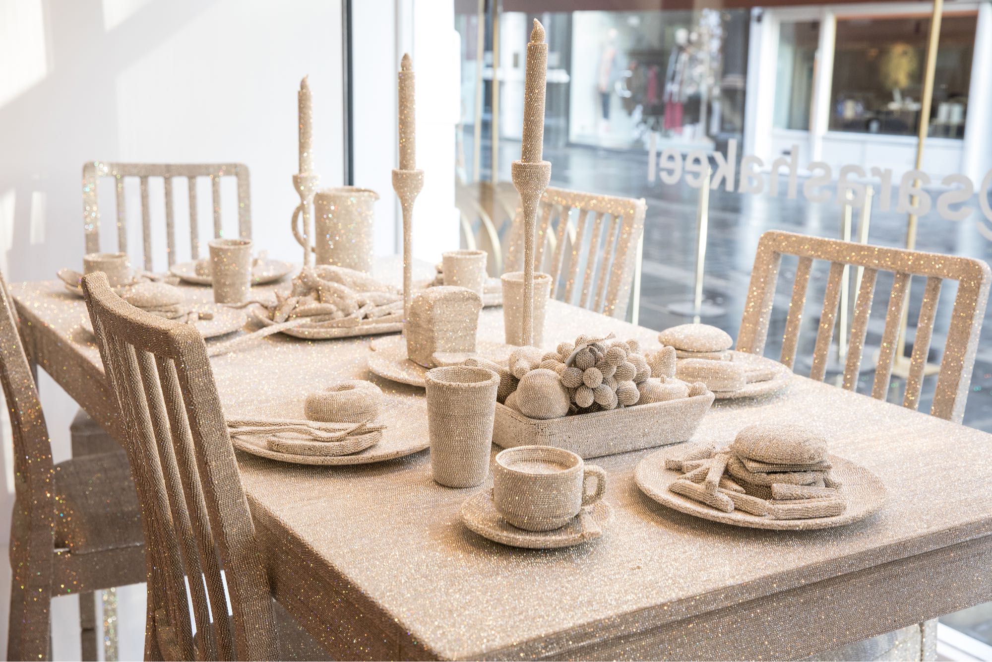 Sara Shakeel ‘The Great Supper’ installation in the windows at Browns South Molton Street