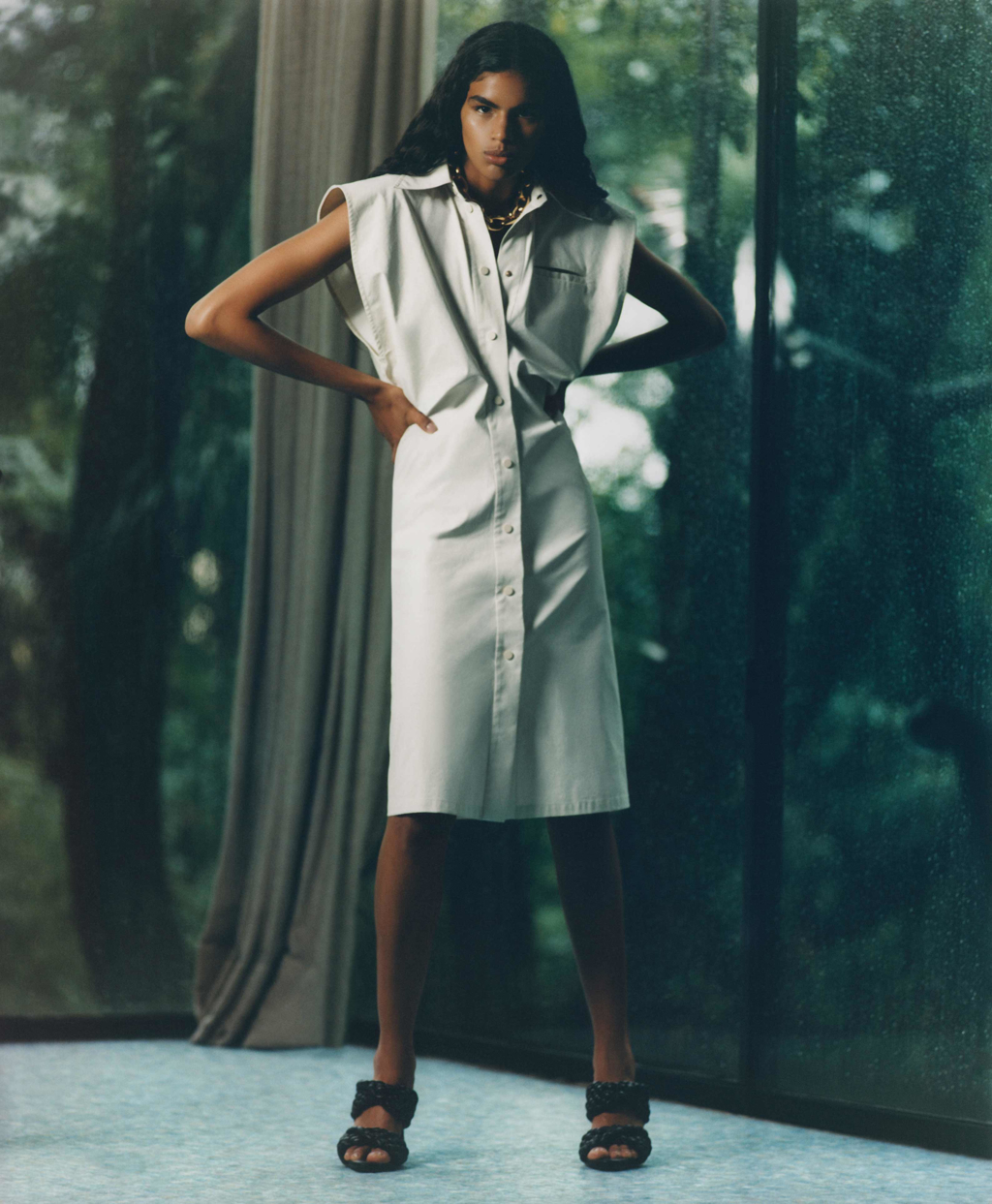 Bottega Veneta white dress in Casa de Vidro by Lina Bo Bardi