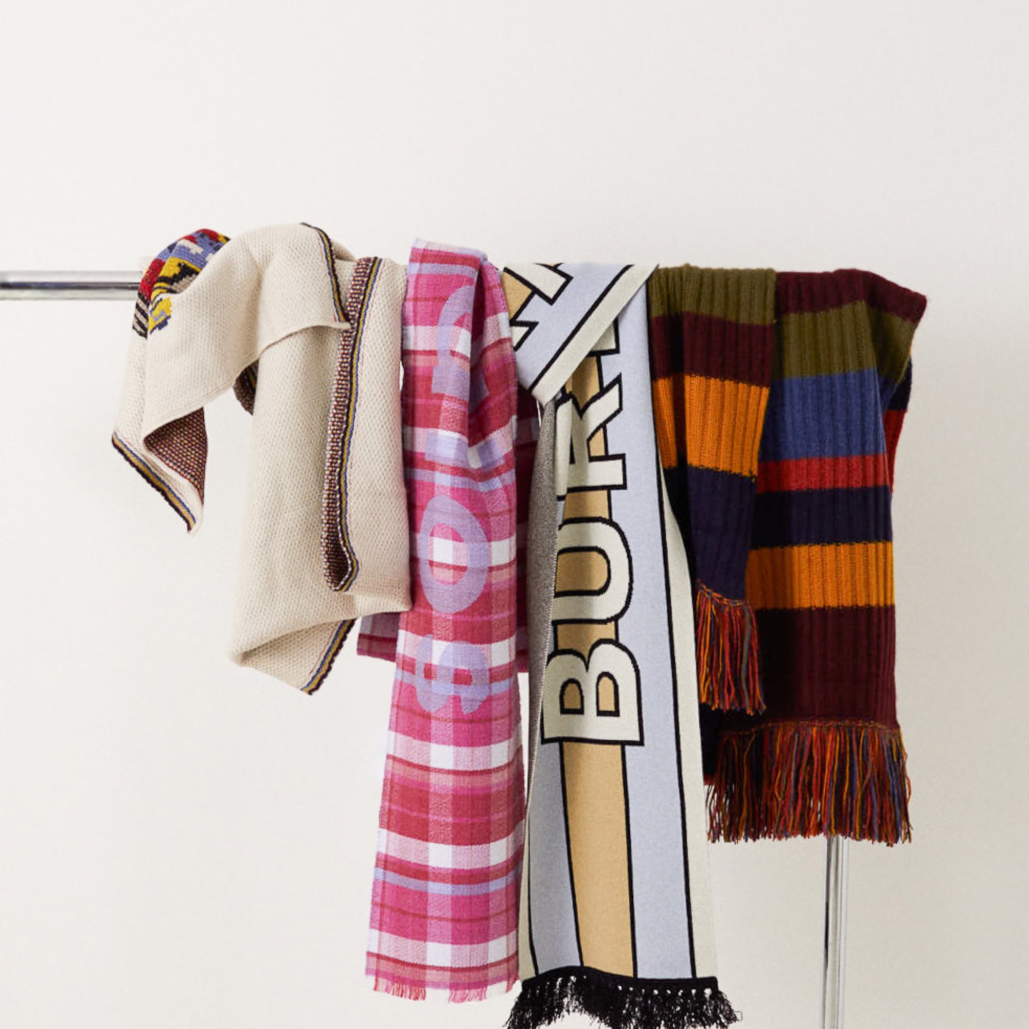 Collection of scarves from Acne Studios, Burberry and Loewe