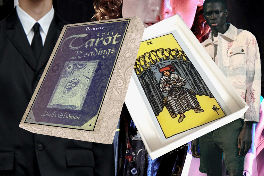 Image of an open tarot card box containing a tarot card