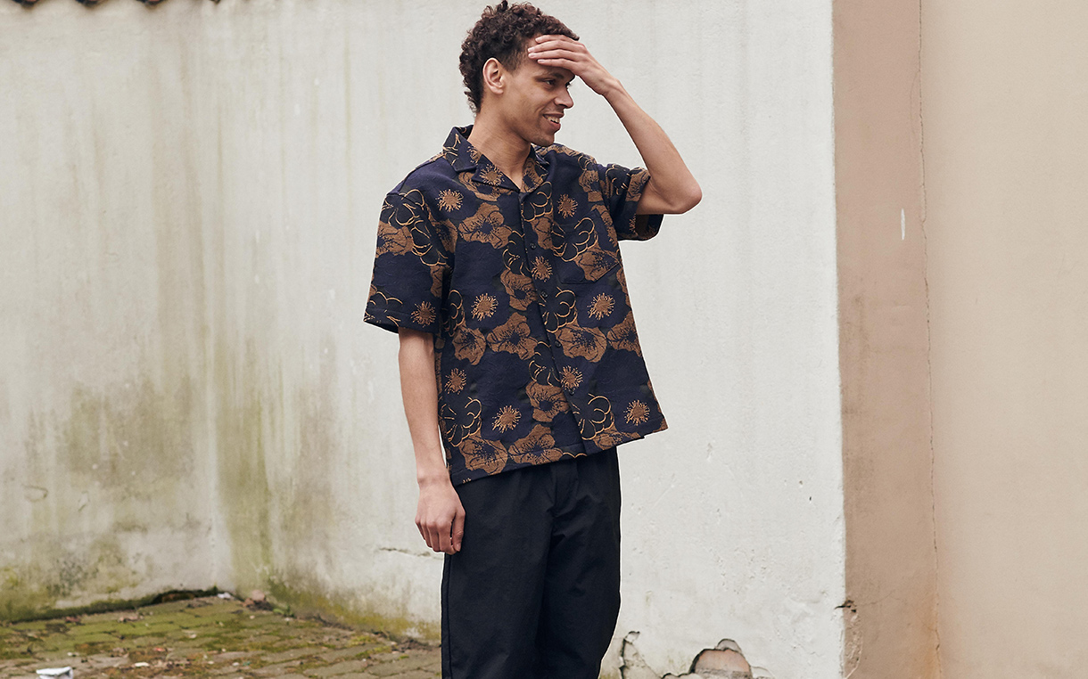 Model wearing Soulland shirt and trousers