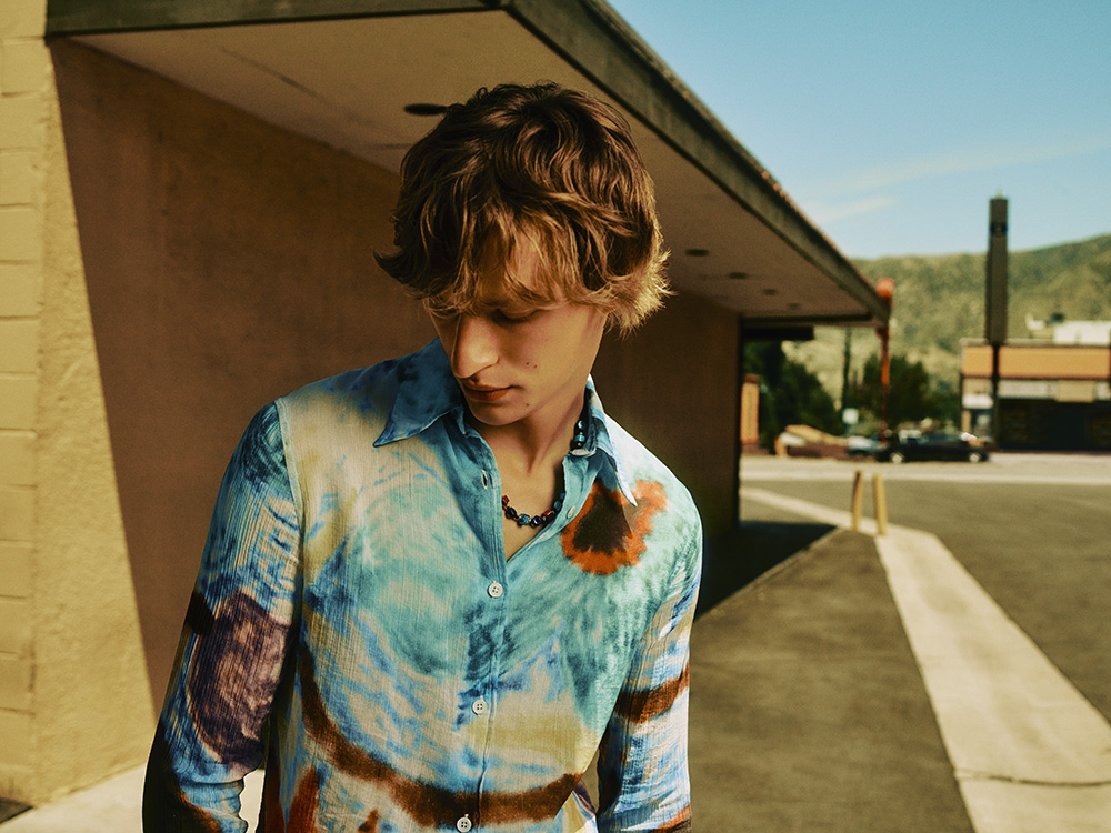 Dream State - Shirt by OUR LEGACY, trousers by CARHARTT WIP (coming soon), shoes by UGG, socks by ERL, necklace by EÉRA