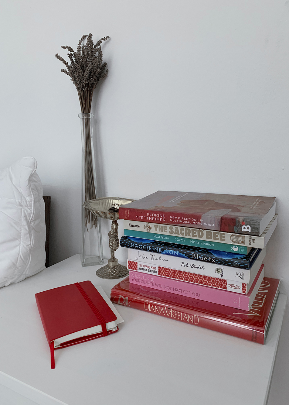 24 Hours With… Talia Byre “My bedside table; a notebook for late night thoughts and ideas and a stack of books I’m reading. I always keep lavender nearby for good sleep.”